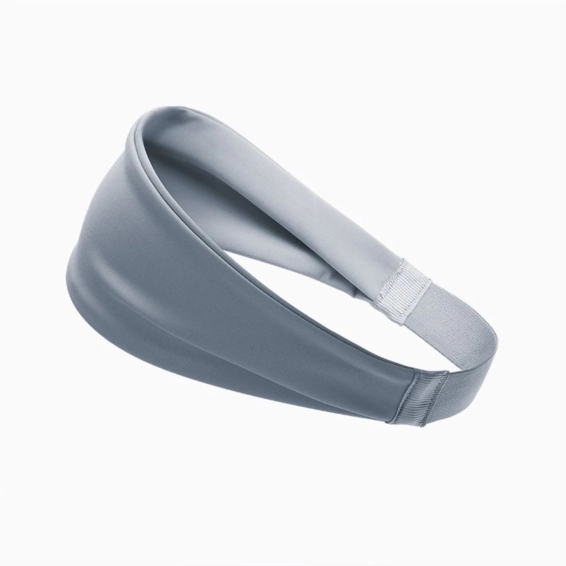 A headband keeps hair in place and absorbs sweat, blending style with function . — HB-80079.3