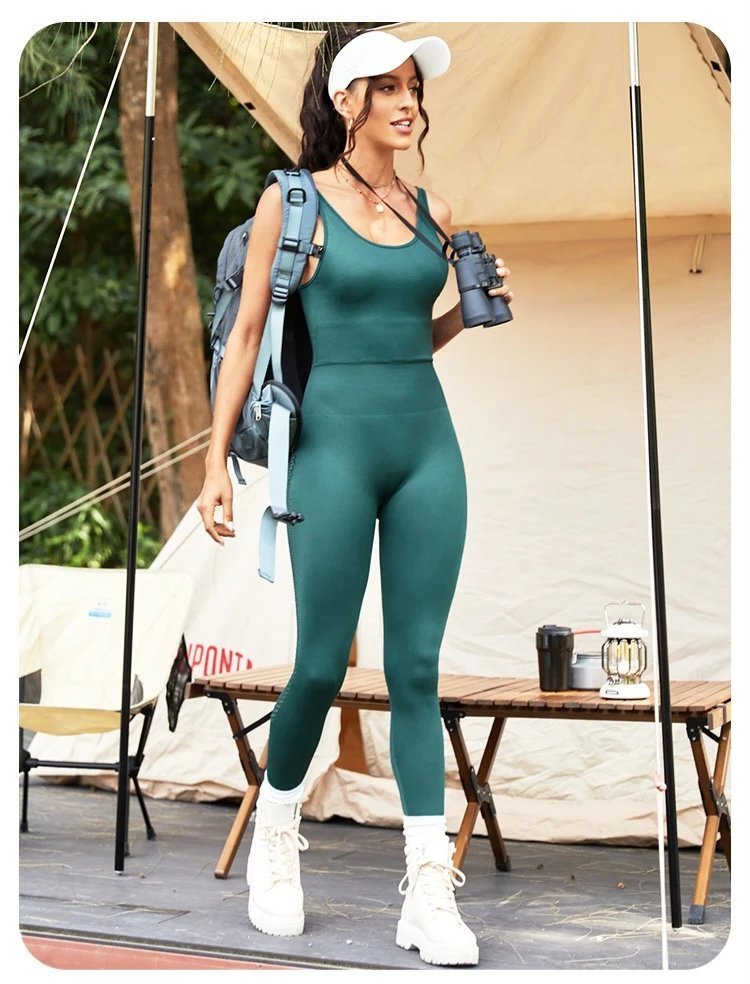 A jumpsuit is a one – piece outfit combining a top and trousers — O-11824