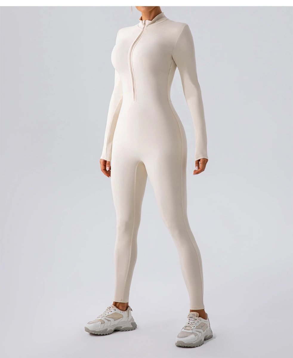 A jumpsuit is a one – piece outfit combining a top and trousers . — O-11846.1
