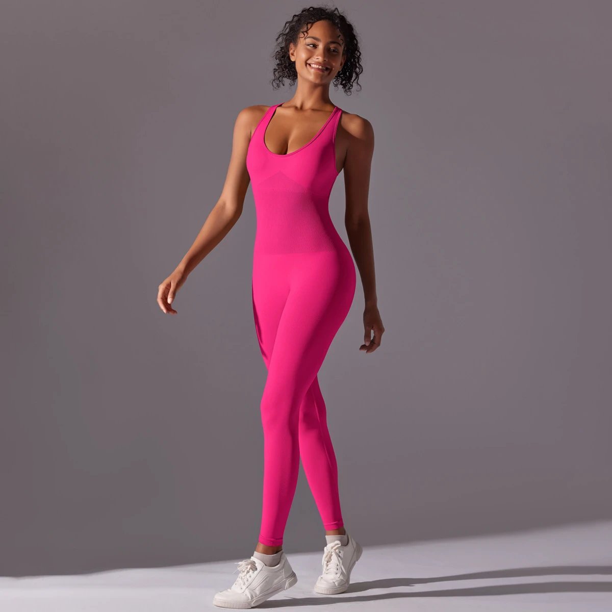 A jumpsuit is a one – piece outfit combining a top and trousers. — O-12018