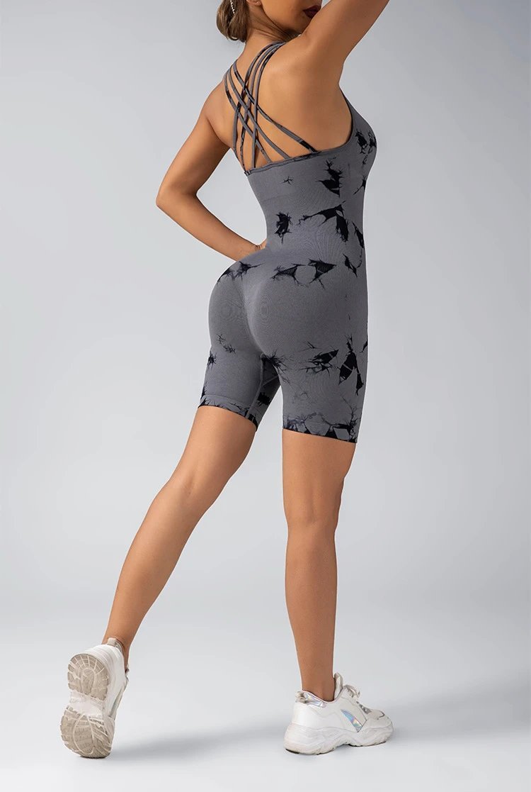 A jumpsuit is a one – piece outfit combining a top and trousers . — O-12020