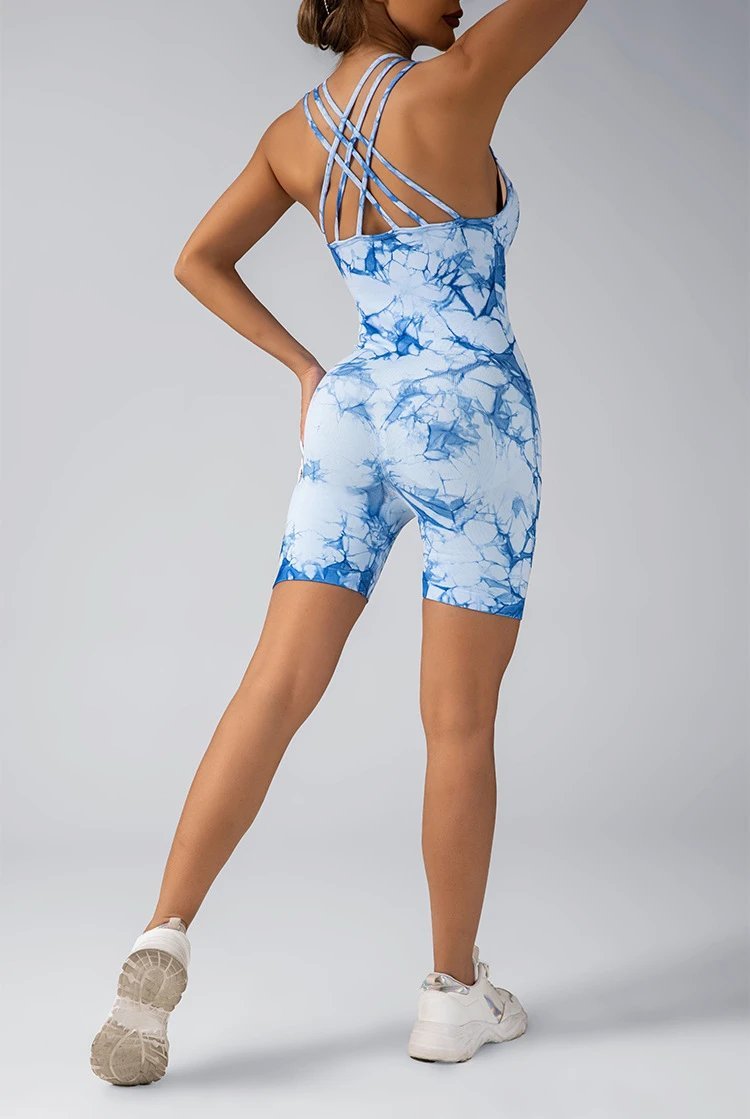 A jumpsuit is a one – piece outfit combining a top and trousers . — O-12023