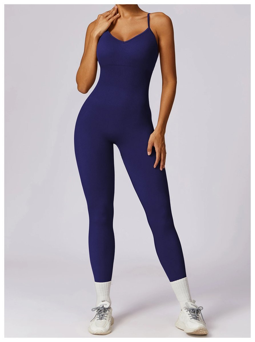 A jumpsuit is a one – piece outfit combining a top and trousers. — O-12028